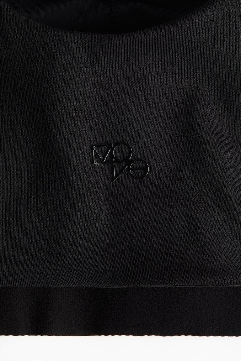 H&M Sport-BH mit DryMove™ Medium Support Kostenlose Rückgabe