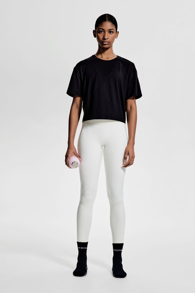 H&M Kastiges Sportshirt mit DryMove™ Limitierter Zeitrabatt