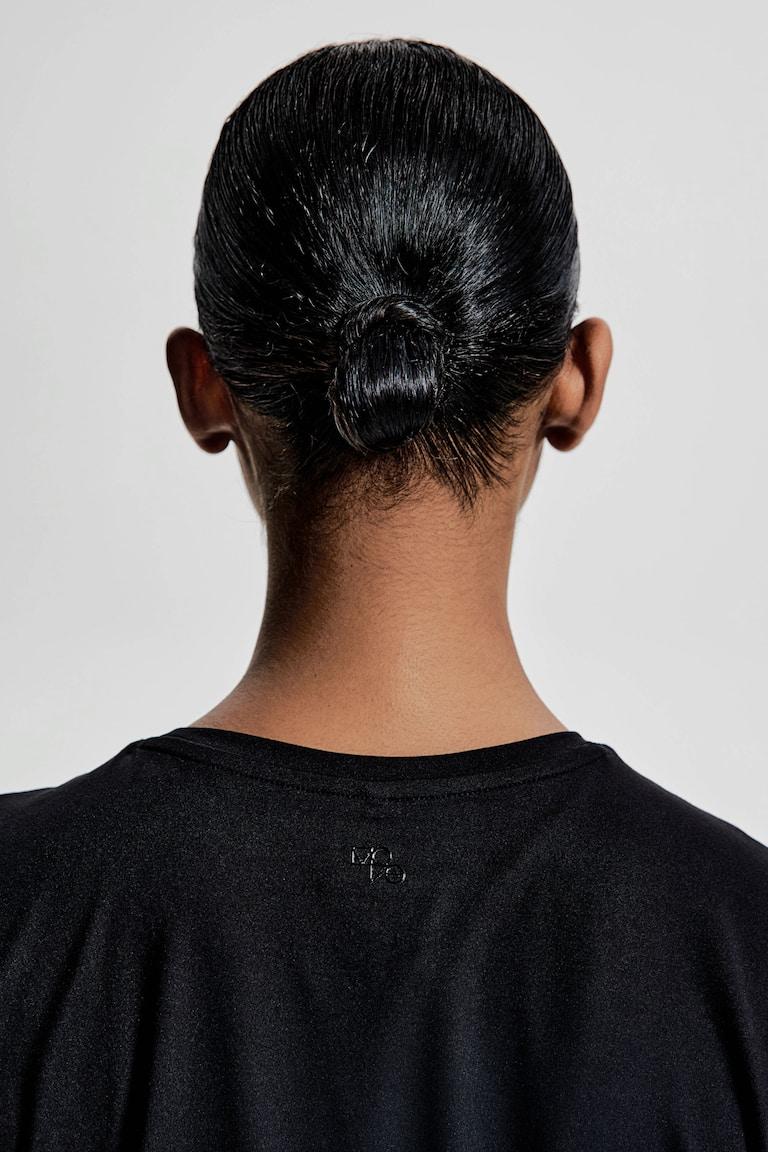H&M Kastiges Sportshirt mit DryMove™ Limitierter Zeitrabatt
