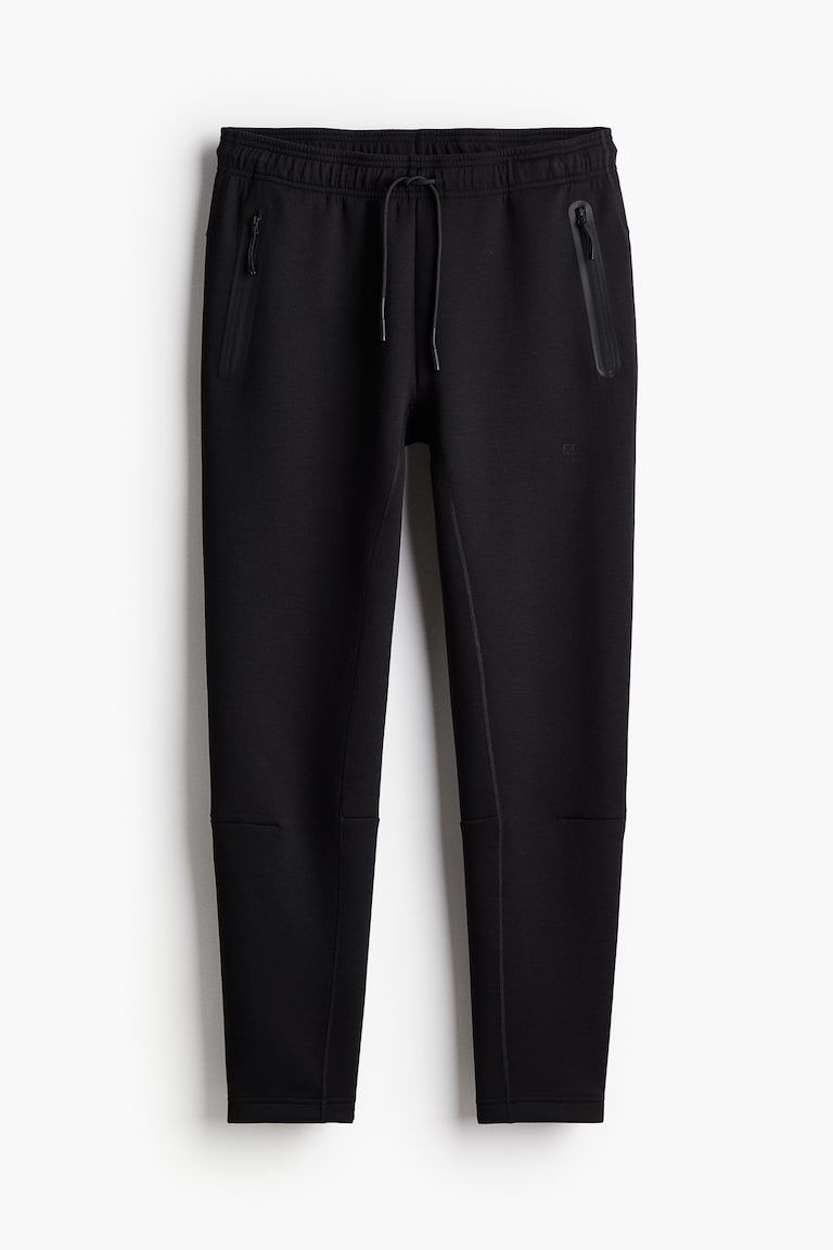 H&M Sport-Joggpants mit DryMove™ in Slim Fit Sonderangebote