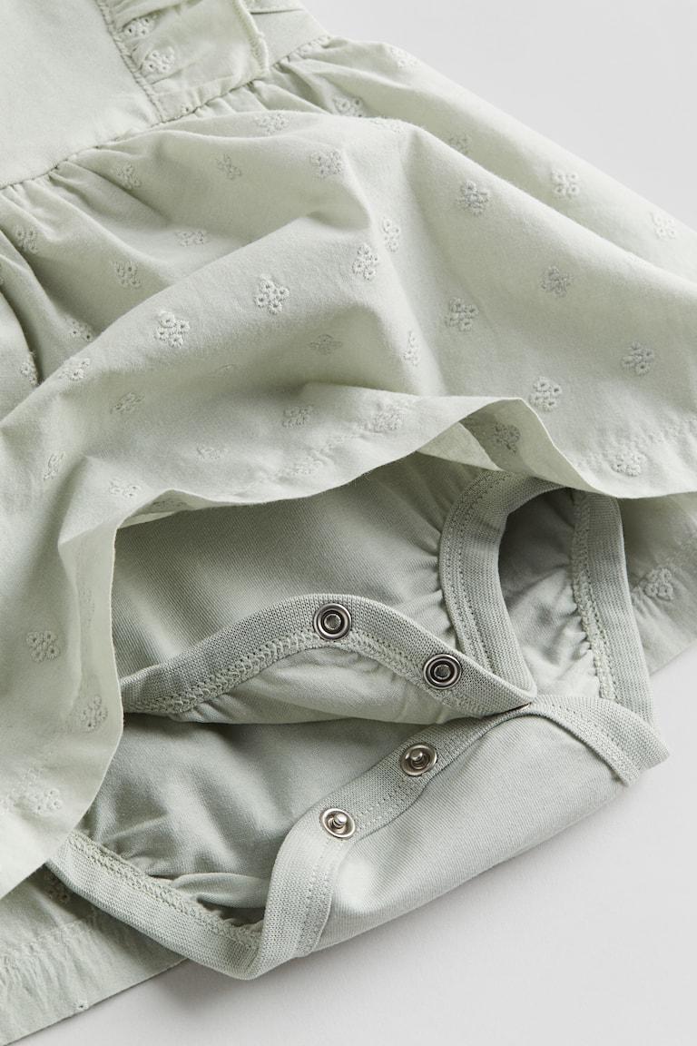 H&M Bodykleid mit Volants Speichern exportieren