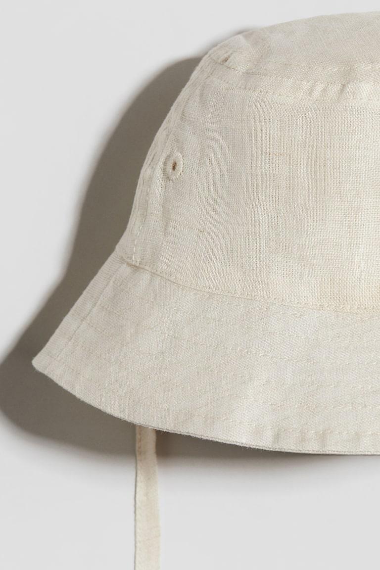 H&M Sonnenhut aus Leinen Rabatt