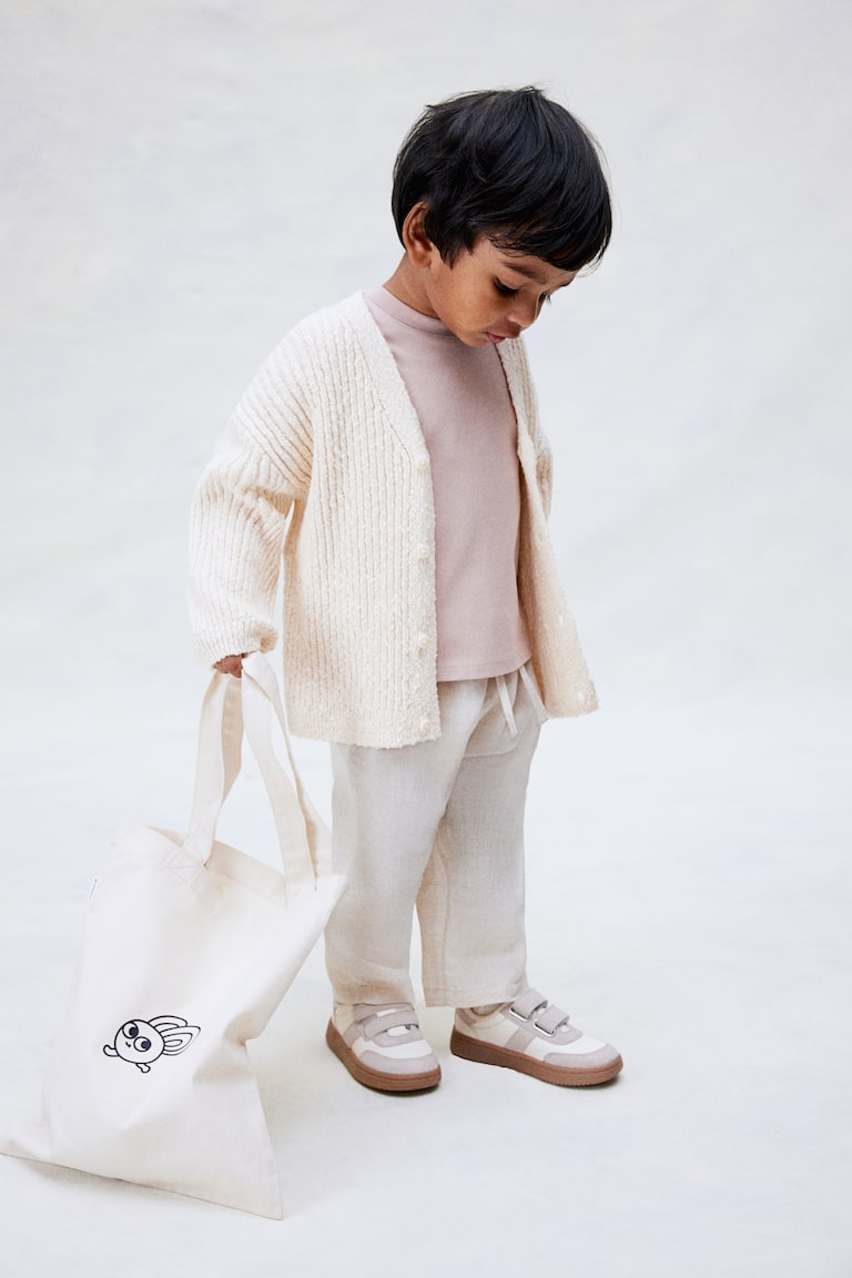 H&M Oversized Cardigan aus Boucléstrick Black Friday