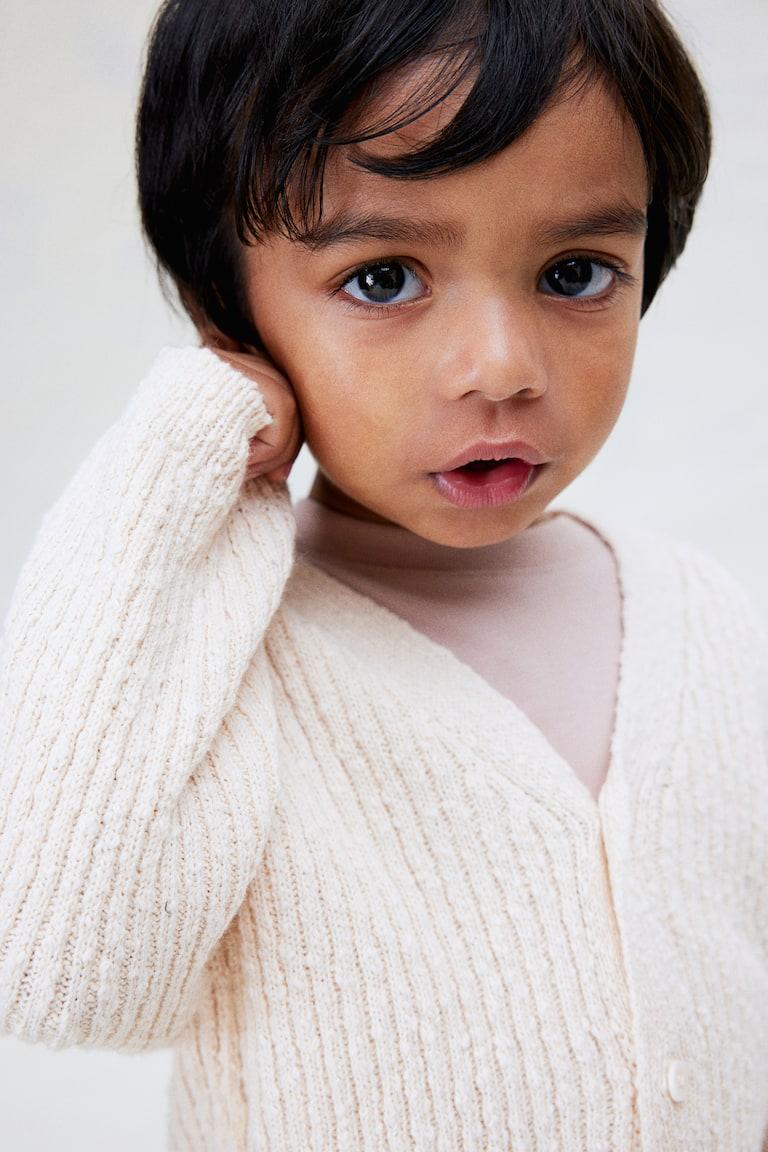 H&M Oversized Cardigan aus Boucléstrick Cyber Monday
