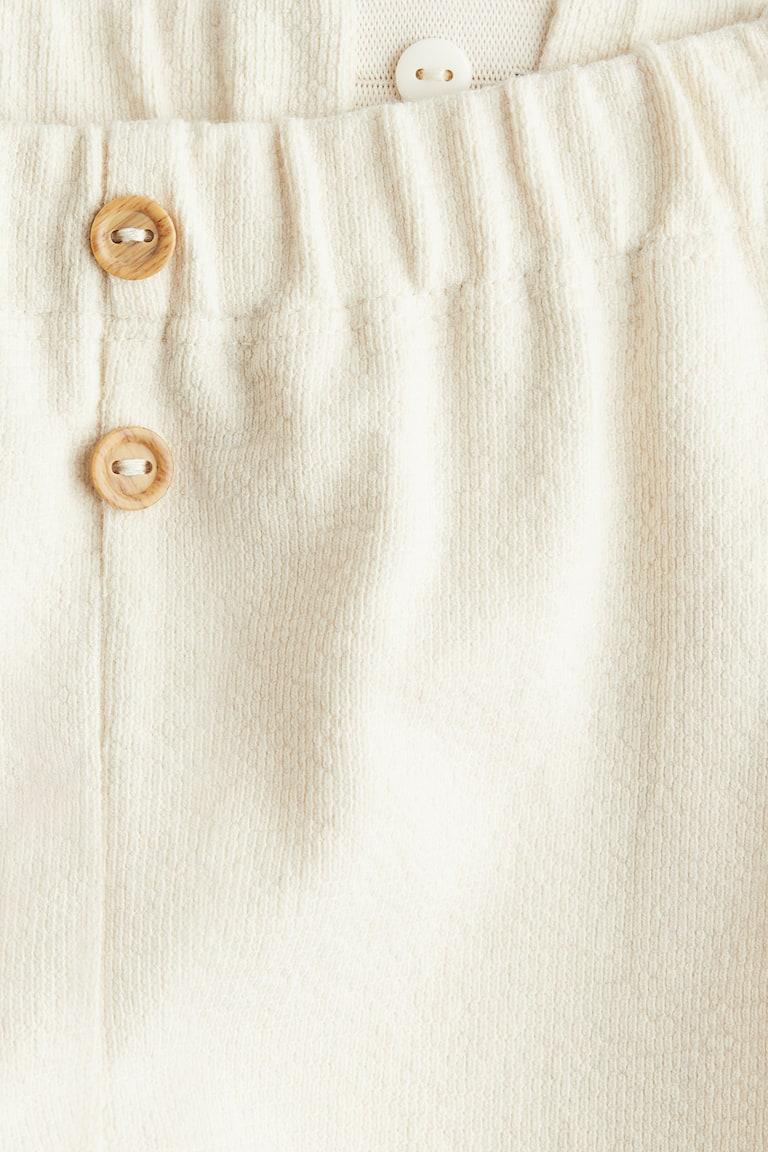 H&M Hose mit Zierknöpfen Sonderangebote
