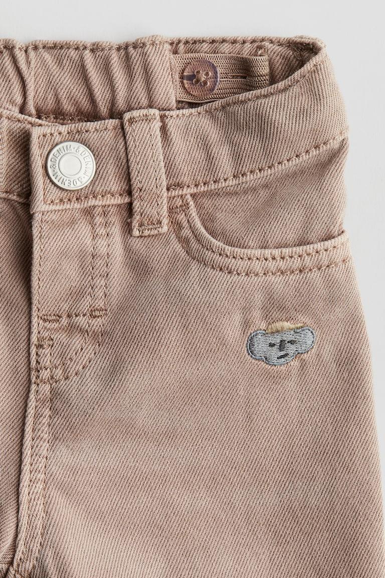 H&M Jeans mit Stickereien Auslauf