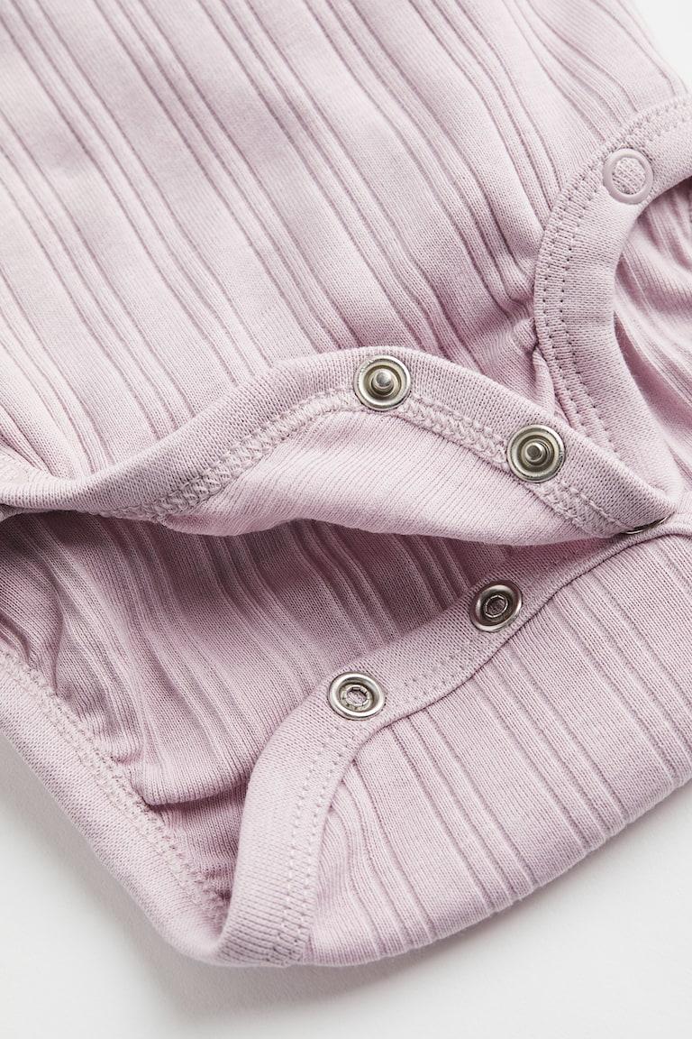 H&M 3er-Pack Gerippte Wickelbodys Räumungsverkauf