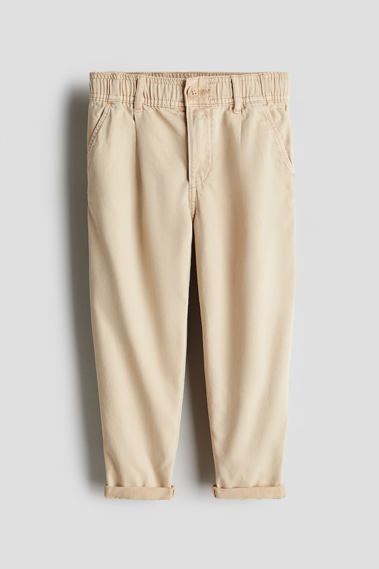 H&M Loose-fit tapered twill chinos Osterangebot