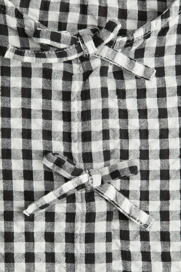 H&M Peplumbluse aus Baumwoll-Seersucker Rabatt