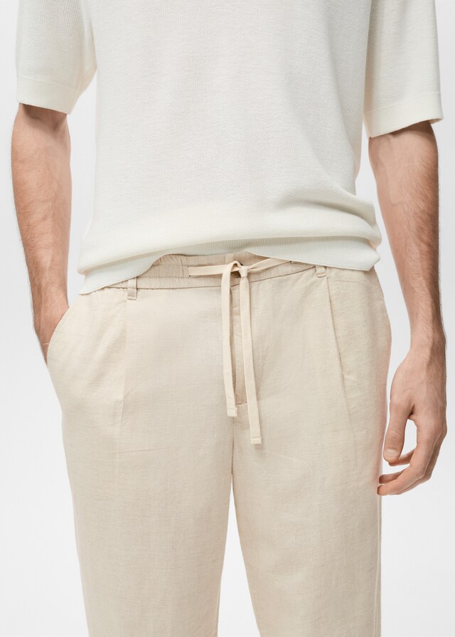 Mango Slim Fit-Leinenhose mit Kordel im Angebot