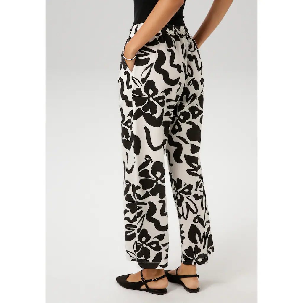 Aniston CASUAL Schlupfhose mit großflächigen Blättern bedruckt - NEUE KOLLEKTION Großer Ausverkauf