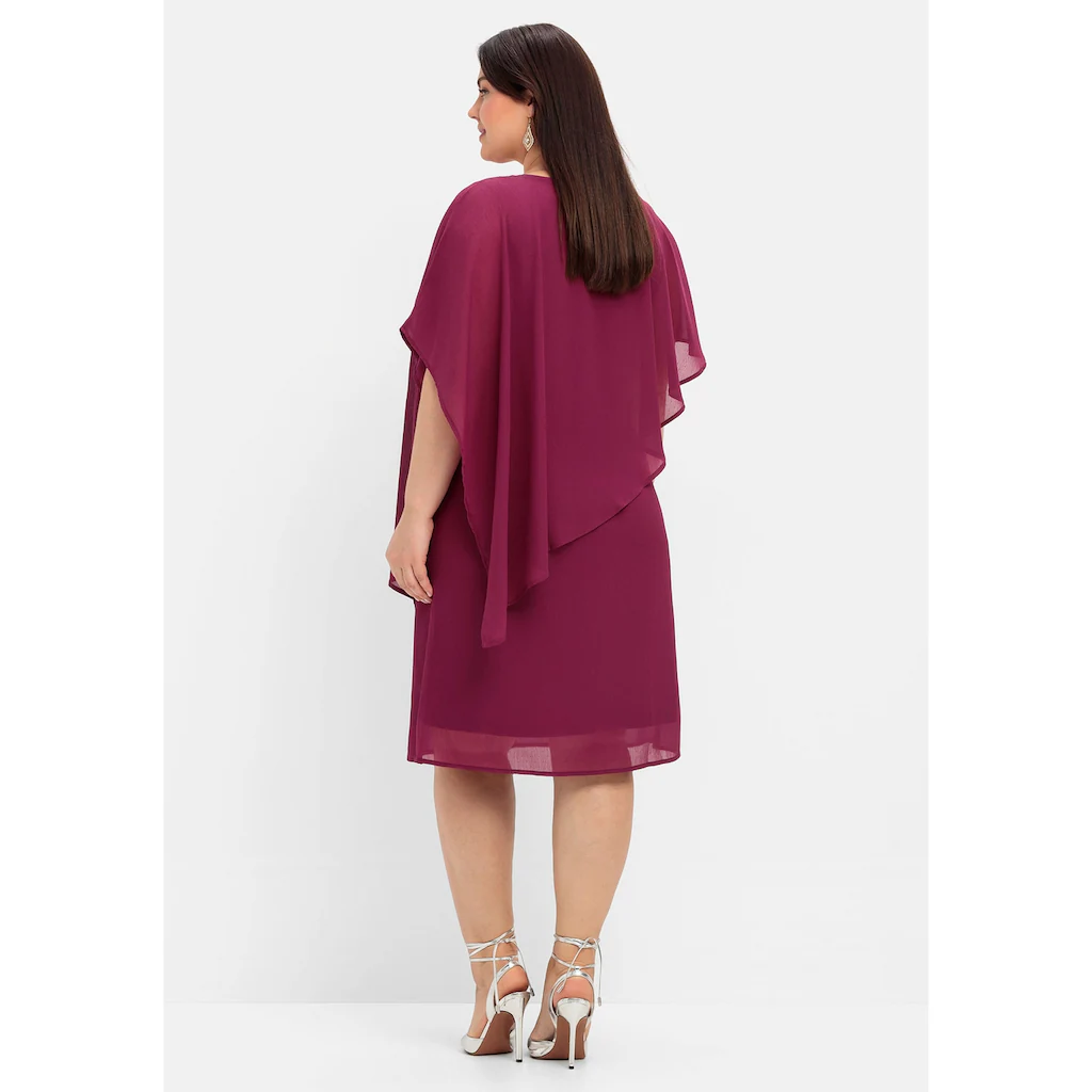 Sheego Cocktailkleid »Große Größen« mit asymetrischem Cape Preisnachlass
